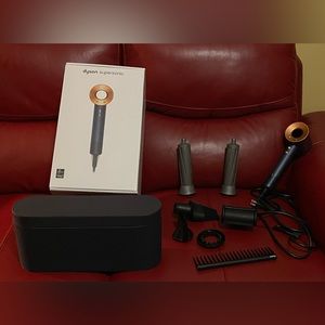 Special edition Dyson Supersonic hair dryer in Vinca blue/Rosé w/6 attachments.